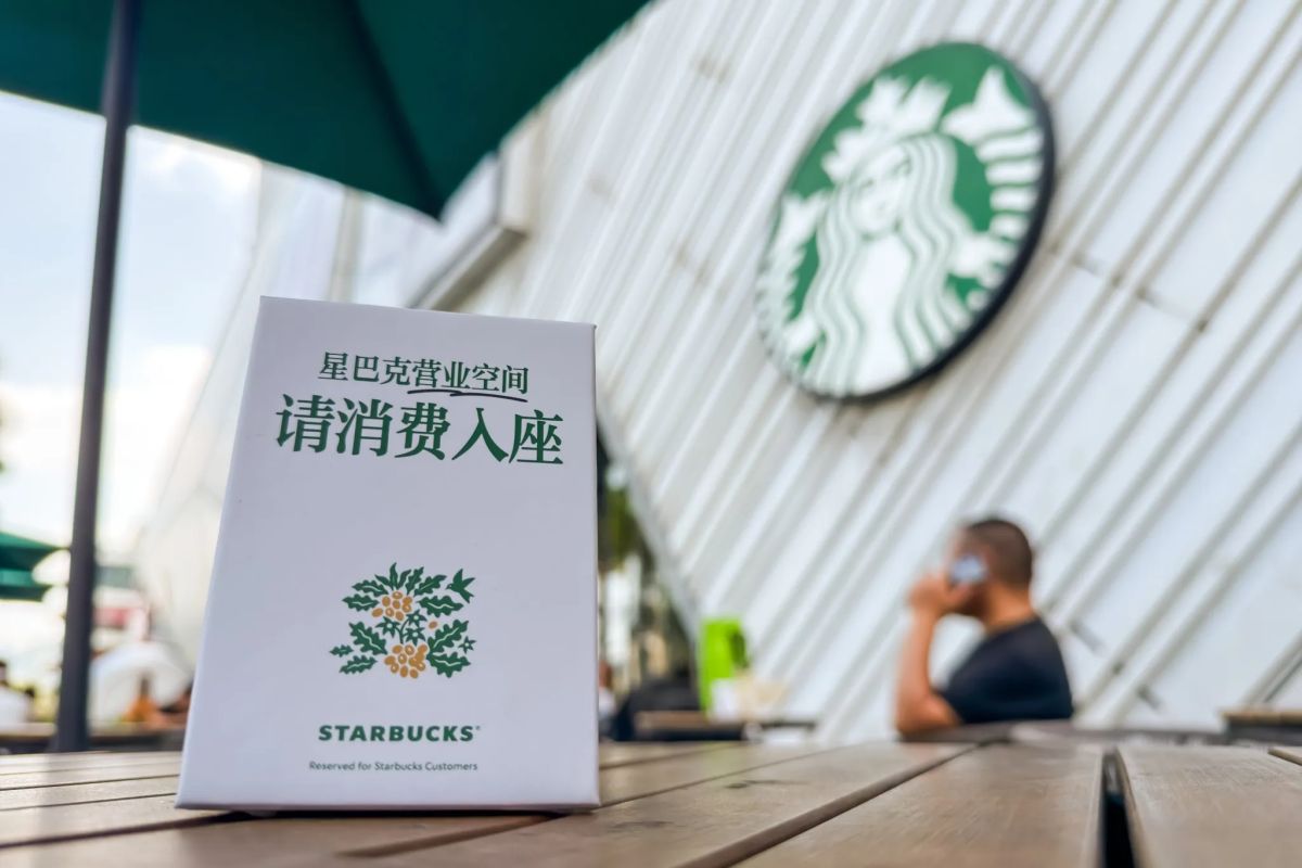 Starbucks China tells customers to buy something before they sit down, as it invests $45 million in the store experience